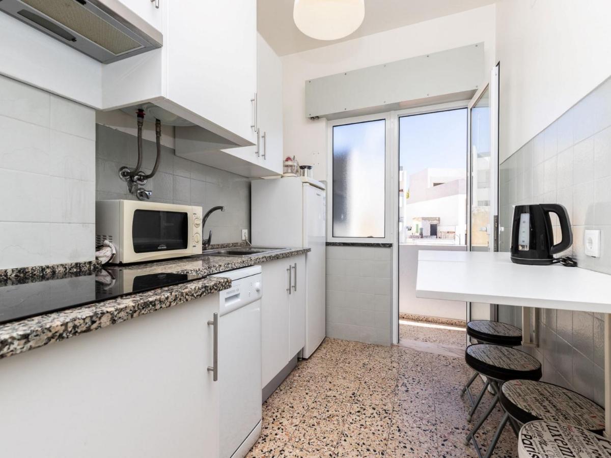 Akisol Faro Sunny Apartment Bagian luar foto