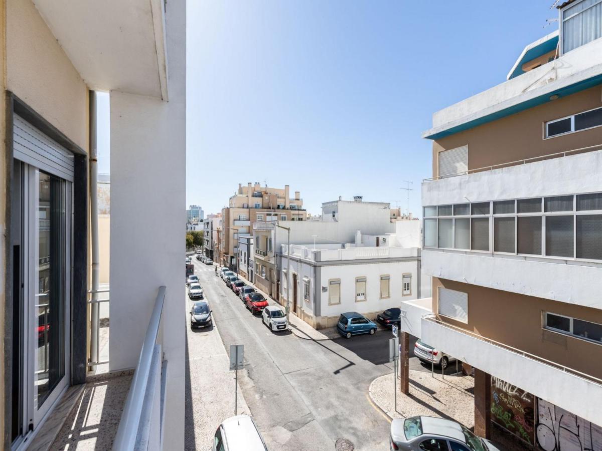 Akisol Faro Sunny Apartment Bagian luar foto
